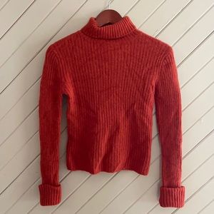 Orange angora turtleneck